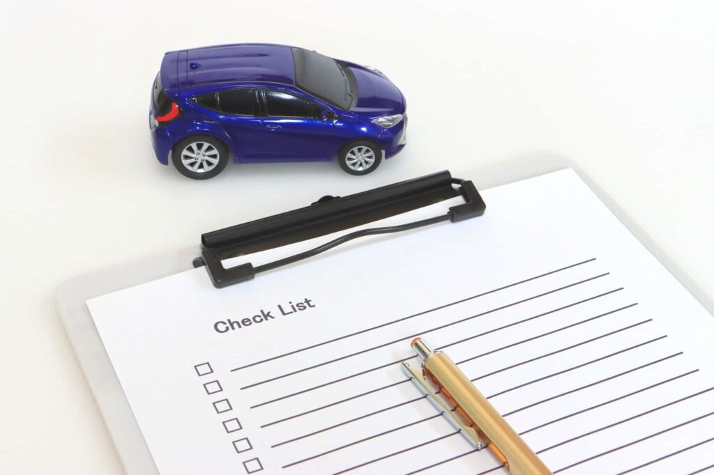 ミニカーとクリップボードとペン