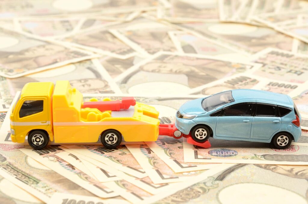 ミニカーがレッカー車に牽引される、費用のイメージ